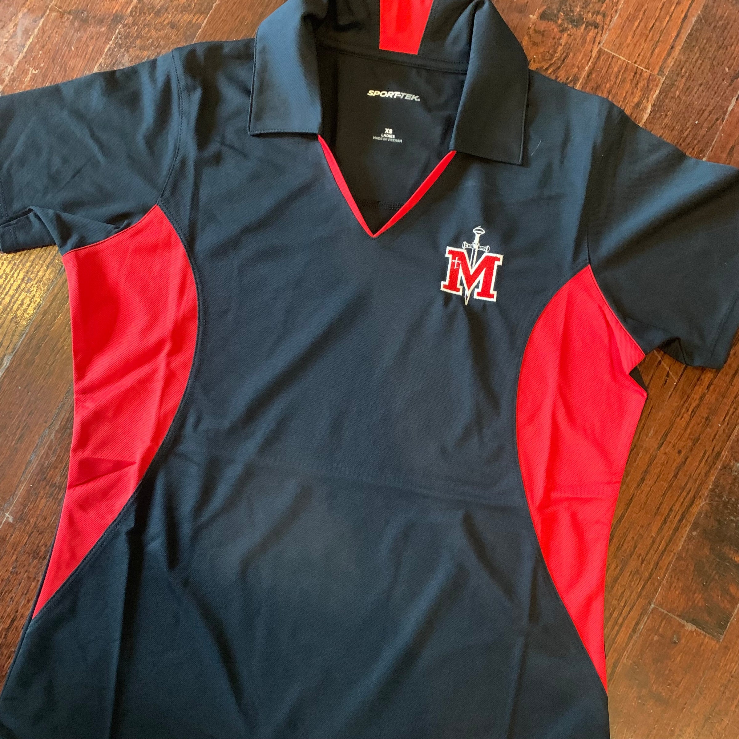Ladies sport tek dri fit short sleeve polo St. Michael High